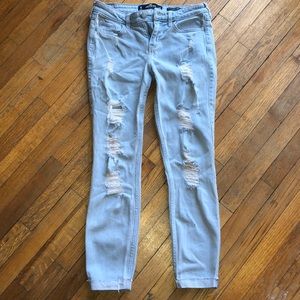 light washed ripped jeans(: